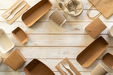 Packaging concept - selection of paper craft packaging on white wood background