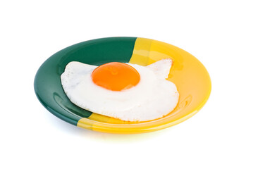 Fried egg on green yellow plate isolated on white background