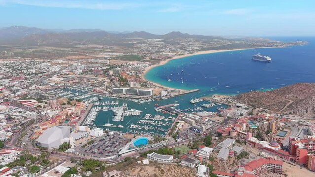 Mexico, Cabo San Lucas: Aerial view of famous resort city on southern tip of Baja California peninsula, Medano Beach (Playa El Medano) - landscape panorama of Latin America from above