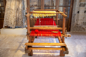 Antique loom in a traditional way of weaving in the ancient village