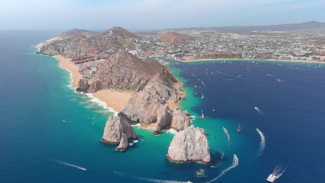 Mexico, Cabo San Lucas: Aerial view of famous resort city on Baja California peninsula, Wejulia Beach and Medano Beach (Playa El Medano) in background - landscape panorama of Latin America from above