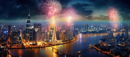 Panoramic view of Bangkok skyline with fireworks at night, Thailand