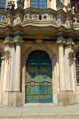 Fototapeta na wymiar Ornamented door on the old university in Wroclaw, Poland. High quality photo