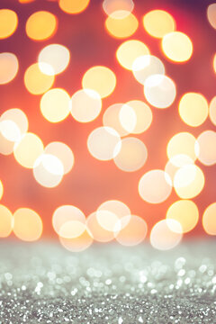 Bokeh background in golden color tones, the blurred festive backdrop for Christmas photography