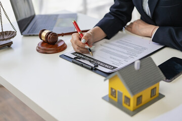 Home Referee Judgment concept with hammer and front view of house. House concepts, law, and...