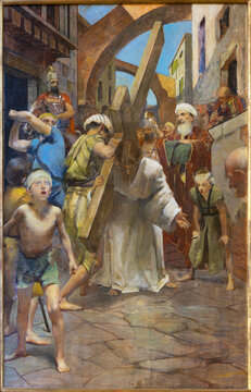 TREVISO, ITALY - NOVEMBER 8, 2023: The painting  Simon of Cyrene helps Jesus carry the cross as part of Cross way stations in the church La Cattedrale di San Pietro Apostolo by Alessandro Pomi (1947).
