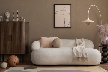 Creative composition of aesthetic living room interior with mock up poster frame, boucle sofa,...
