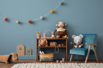 Warm and cozy living room interior with blue wall, rattan sideboard, stylish armchair, plush whale,...