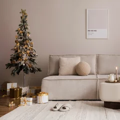 Gordijnen Domestic and cozy christmas living room interior with corduroy sofa, white shelf, mock up poster frame, christmas tree, decoration, wreath, gifts and accessories. Home decor. Family time. Template. © FollowTheFlow