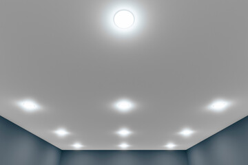 Recessed ceiling lights in a white stretch ceiling. - obrazy, fototapety, plakaty