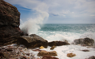waves crashing on rocks
