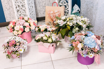 White, beige wedding bouquet. Bride, hands, arms