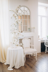 Fototapeta na wymiar Elegant wedding dress, shoes and bouquet in room