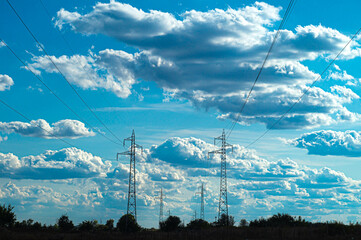 Electric poles and dramatic sky