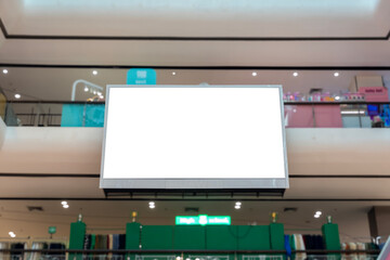 Large White LED Screen Hanging from Ceiling in modern shipping center.