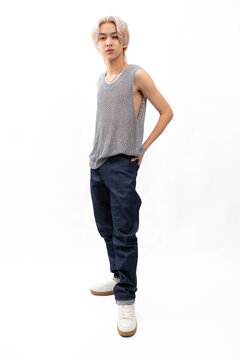 Vest top. Tank t-shirt. loungewear. Fashion portrait Asian young man. model, clothing and cosmetics. Young male model fashion lifestyle in fashionable clothing on isolated white background