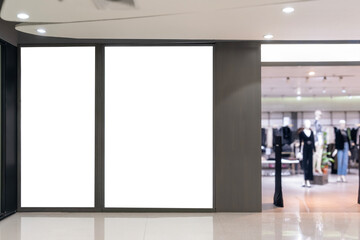 Vertical LED TV Screen at Front of fashion bag store in Shopping Mall.