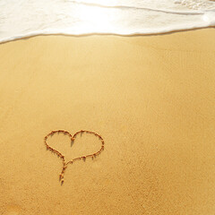 Heart on beach with sunset. Romantic composition.