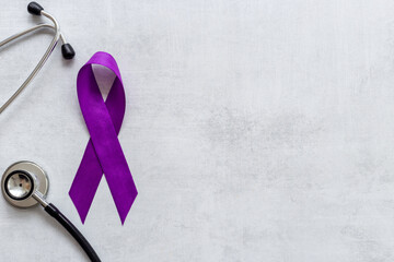 Purple ribbon - pancreas cancer awareness and Alzheimer's disease concept