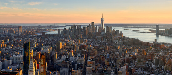 Aerial cityscape of New York City. Panoramic view of Lower Manhattan skyscrapers and Hudson River...