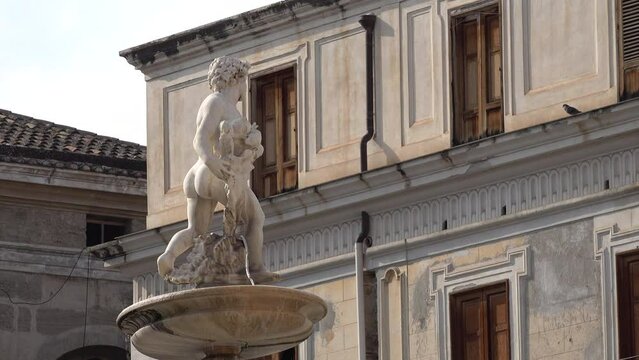 Close-up of statue of the fountain of Pretoria in Palermo, Italy
