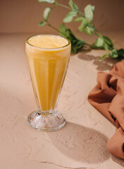 Tasty banana smoothie or milkshake