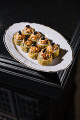 Warm sushi rolls with tempura cream cheese
