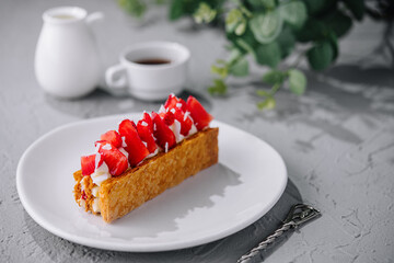 Piece of Napoleon Cake with Strawberry on plate