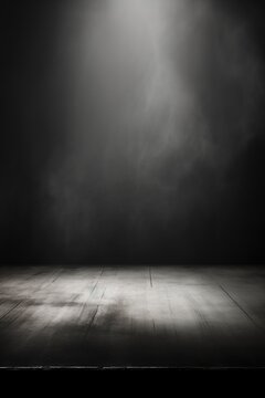Portrait image of dark and empty space of Studio grunge texture background with spot lighting and fog or mist in background.