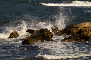 Sea waves crashing on rocks