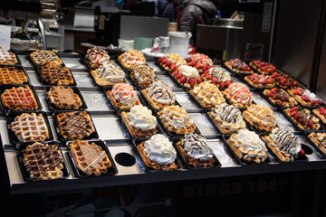 Waffles and Waffle, typical pastries of Brussels Belgium, sold in many shops in capitol of Europe