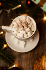 Fototapeta na wymiar Croissant and marshmallow on the New Year's table. Romantic Family Evening