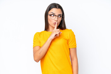 Young caucasian woman isolated on white background showing a sign of silence gesture putting finger...