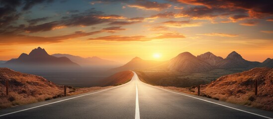 Scenic landscape with road and mountain silhouette at sunset Copy space image Place for adding text or design