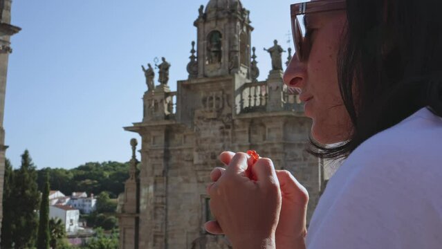 Solemn Prayer: Woman Seeks Spiritual Solace Near the Church