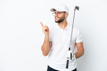 Handsome young man playing golf  isolated on white background intending to realizes the solution...