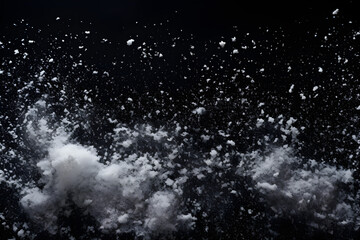 Snow on a black background is a graphic resource for editing or a blank for a designer, enhanced by human touch,