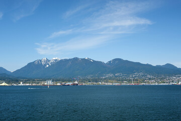 various recognizable places and attractions of Vancouver in Canada city center parks places for people to walk roads in spring good weather clean downtown blue sky huge buildings. skyscrapers 