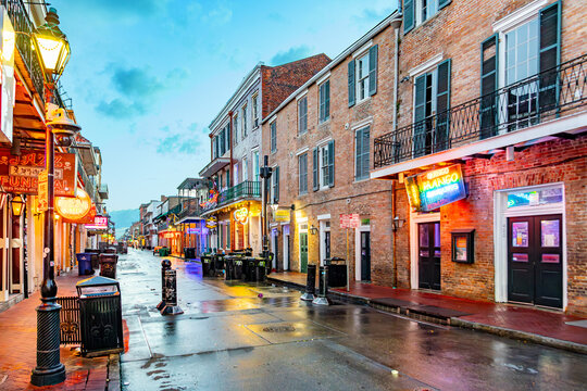 cleaning the Bourbon street in early morning after a party night in New Orleans