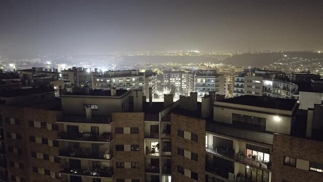 Night view of modern urbanization in Lisbon Portugal. Odivelas, Cruzeiro hills.