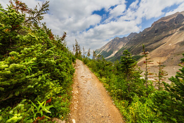 Hiking trail to Plain of Six Glaciers. Narrow path in the mountains. The Rocky Mountains. Banff...