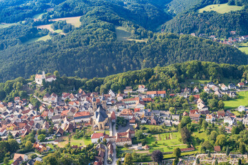 Fototapeta na wymiar The landscape of Franconian Switzerland near Gößweinstein - Germany seen from a small aircraft