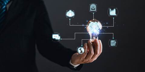 innovation technology success business. person hand holding a power lightbulb and pretending to think, inspiration, creativity, and imagination concept, Digital transformation. Ai technology.