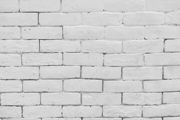 close up on retro grunge white in brick wall in loft style background for architectural exterior buildings material concept