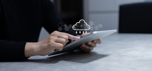 close up young man press synchronized button on application to upload and download data from cloud computing with virtual network icon for futuristic technology and lifestyle concept