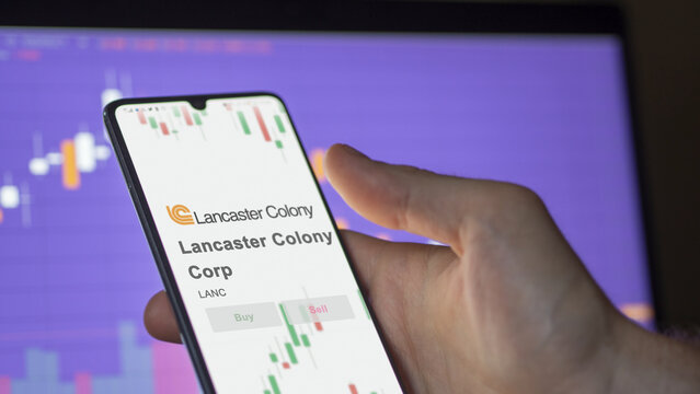 November 20th 2023. The logo of Lancaster Colony Corp on a giant white screen, the brand  on a device.