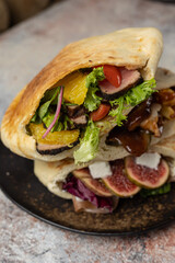 delicious pita with meat and cheese