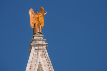 Aerial view of the Venice town in Italy. View of the golden Archangel Gabriel Statue Campanile Bell Tower in Venice.