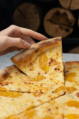 delicious pizza with oranges and cheese