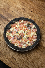 tasty pizza with salami and cheese